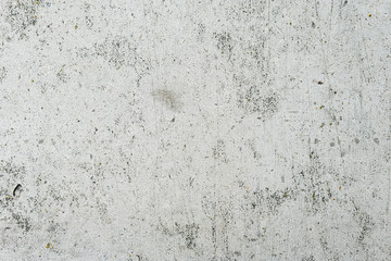 Wall fragment with scratches and cracks