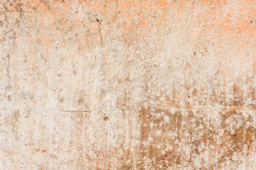 Wall fragment with scratches and cracks