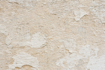 Wall fragment with scratches and cracks