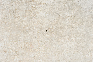 Wall fragment with scratches and cracks