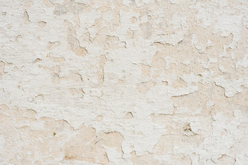 Wall fragment with scratches and cracks