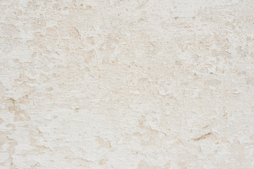 Wall fragment with scratches and cracks