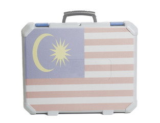 Business travel suitcase with flag of Malaysia