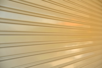 Closeup of steel roller shutter door. Selective focus.