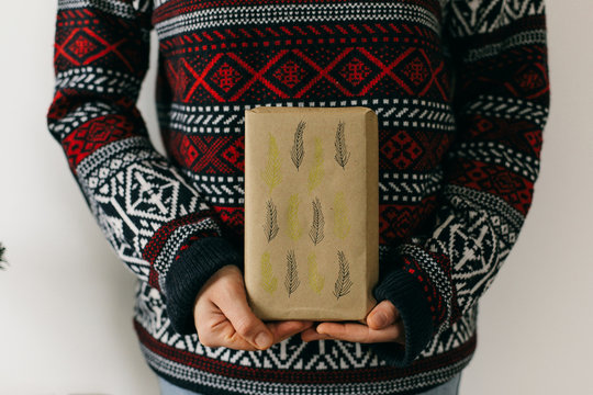 Woman holding a christmas present