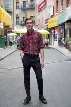 Full body portrait of a man in Chinatown