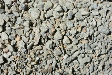 Beautiful graphite graphite stones of different sizes from large to small in the sun light