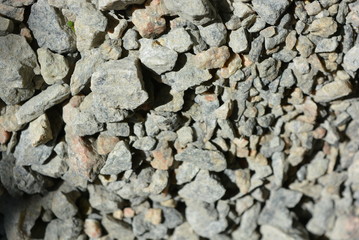 Beautiful graphite graphite stones of different sizes from large to small in the sun light