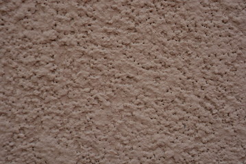 A construction background of a carrots of a brown color background with dots and balls