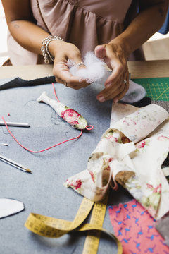Woman creating accessories for the clothes
