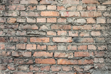 Wall of old orange brick