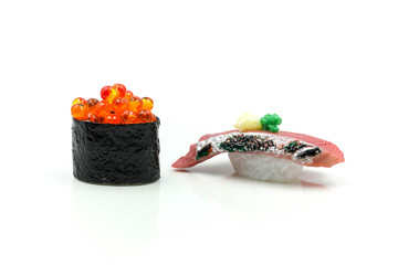 Salmon egg on sushi nigiri roll and Sushi.