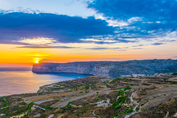 Sunset view over Sanap cliffs on Gozo, Malta