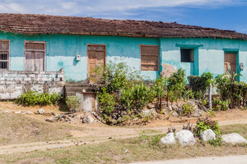 Fototapeta na wymiar Small house in Condado village in Valle de los Ingenios valley near Trinidad, Cuba