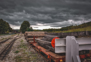 Railroad crossing against cloudy backdrop