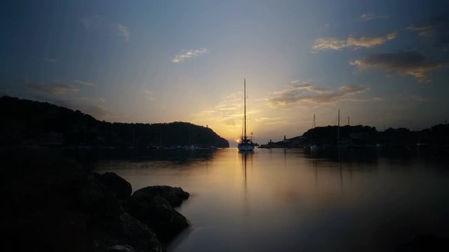 4k time lapse of sunset over the Mediterranean Sea at Port de Soller on the coast of Mallorca