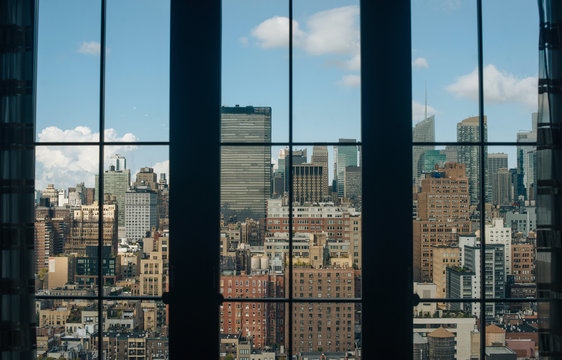 Fototapeta City skyline seen through window