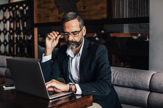 Businessman Looking on His Watch