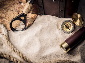 Columbus day. Pirates and treasure with worldmap and discovery equipment.