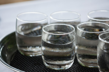 Glass of very cold water in wedding party.

