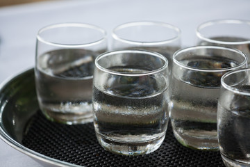 Glass of very cold water in wedding party.

