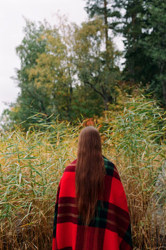 Woman in autumn scene