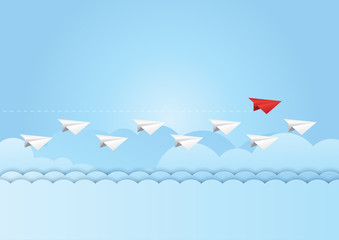 Business teamwork and leadership concept with Red paper plane leading the white group on blue sky background. Paper art vector illustration.
