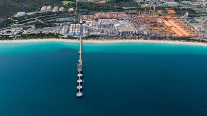 aerial view of large industry on the coastline