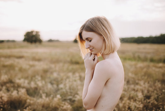 Portrait of topless woman