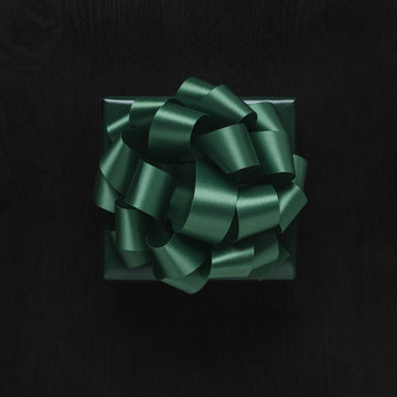 Top view of wrapped Christmas present with bow