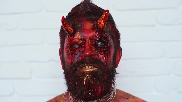 Devil vampire portrait. Halloween red devil monster. Krampus. Christmas devils. Halloween.