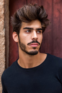 Portrait of a handsome young man with goatee