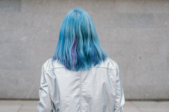 Back view of girl with blue hair