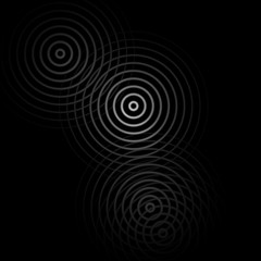 Abstract white rings sound waves effect on black background