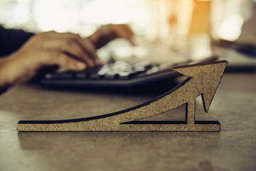 Business metric focus icon and team businessman's job working with calculator at background