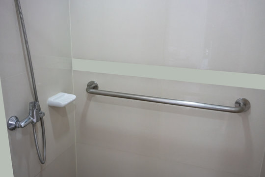 Bathroom interior in patient room with basic required equipment. Modern design