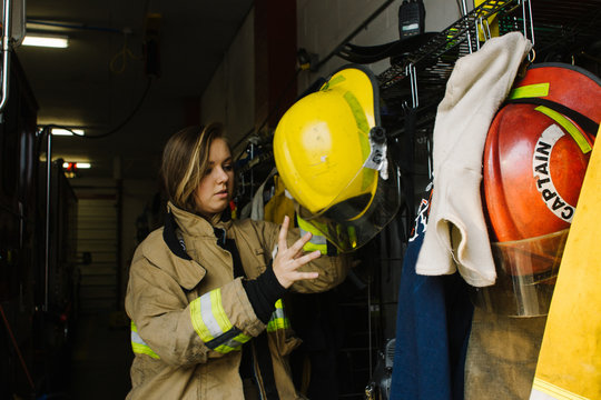 teenage firefighter volunteer wearing firefighting clothing