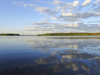 Summer landscape: a serene evening on the lake