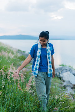 Asian woman in the meadow