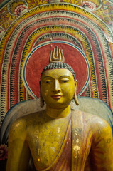 Buddha statue close up at Dambulla Cave Temple, Sri Lanka