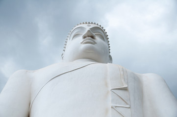Close up of Samadhi Buddha statue on top of Elephant Rock at Kurunegala city, Sri Lanka