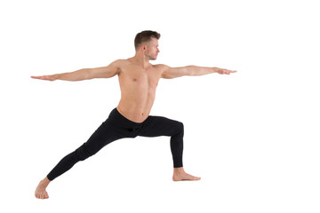 Fototapeta na wymiar Yoga and a healthy lifestyle. Sexy man. White background. 