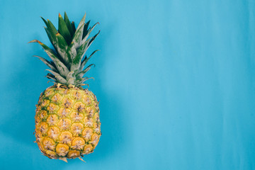 fresh pineapple isolated on blue background