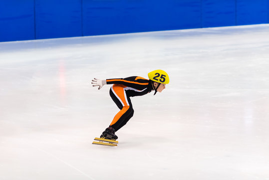 Speed Skater Racing  In An Ice Rink