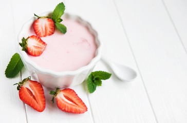 Bowl with strawberry yogurt