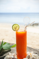 tropical papaya juice on the beach