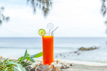 tropical papaya juice on the beach