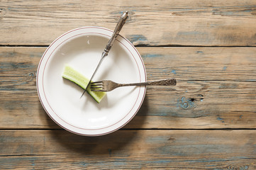 Diet plate of vegetable on wood vintage background