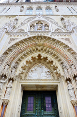 Fototapeta na wymiar Beautiful Carved Decorative Angels above Zagreb Cathedral Entrance