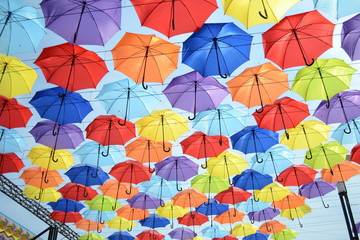 Fototapeta na wymiar Colorful umbrellas in park Arcadia Odessa, Ukraine